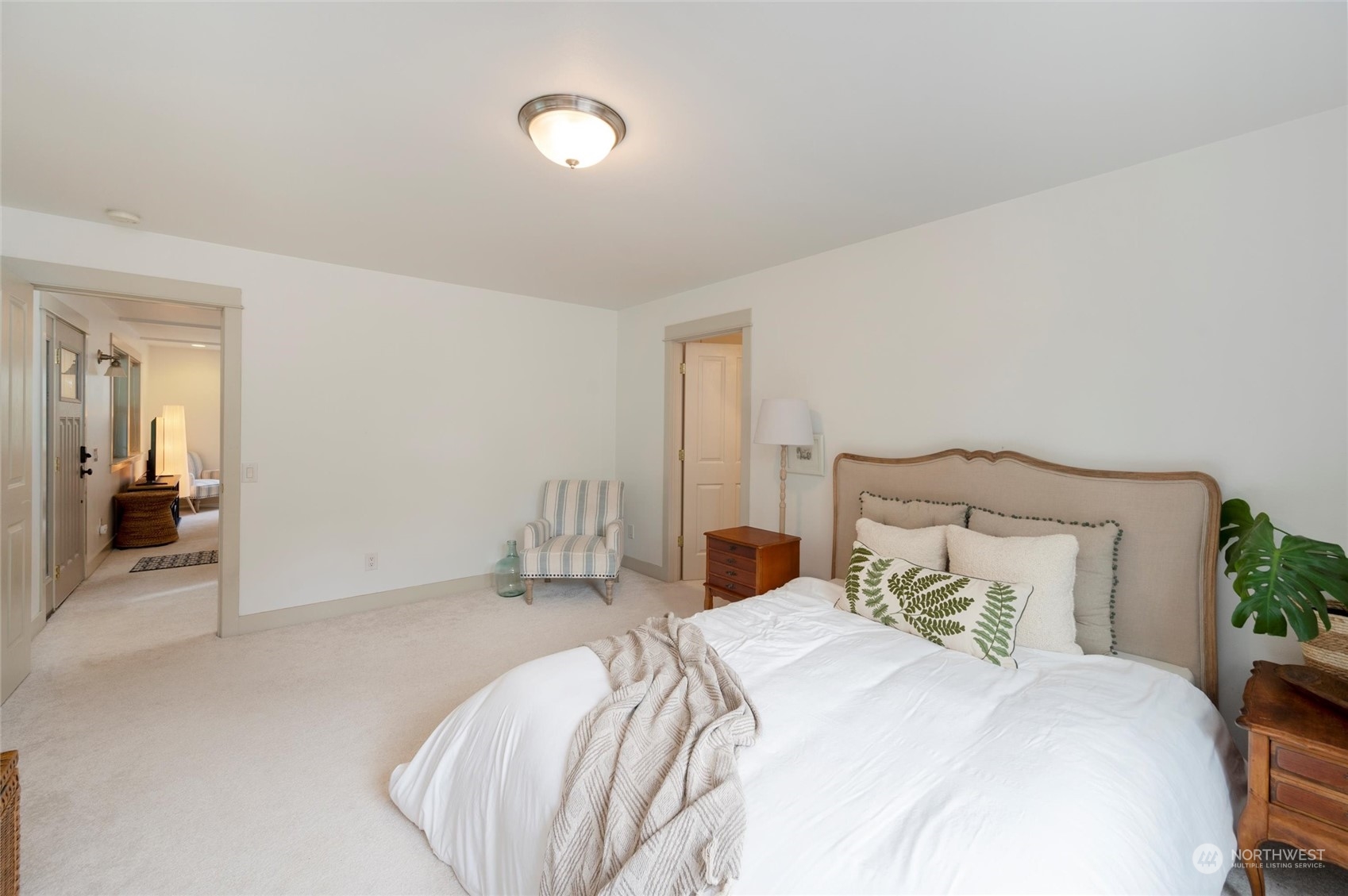 3703 Fielding Avenue Bellingham, WA 98229 - Photo 18 of 40 a bedroom with a bed and a large mirror