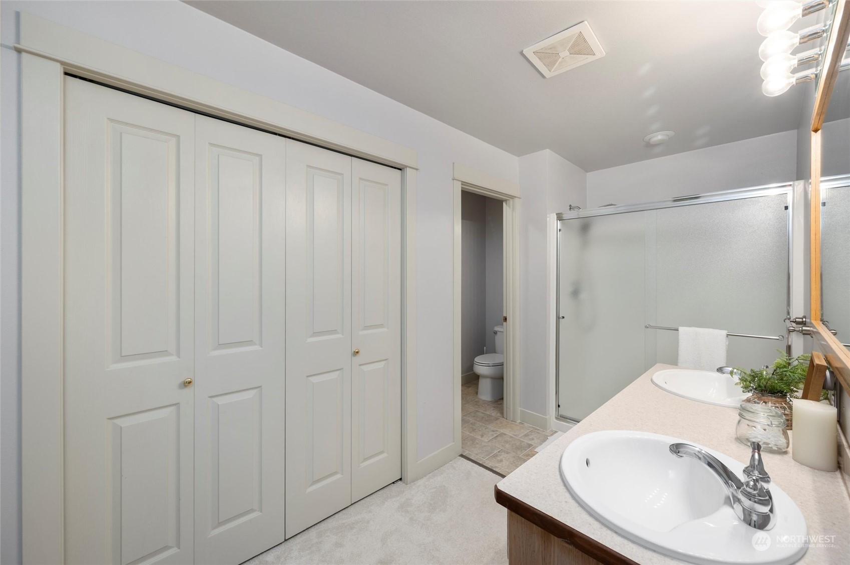 3703 Fielding Avenue Bellingham, WA 98229 - Photo 21 of 40 a bathroom with a sink and a mirror