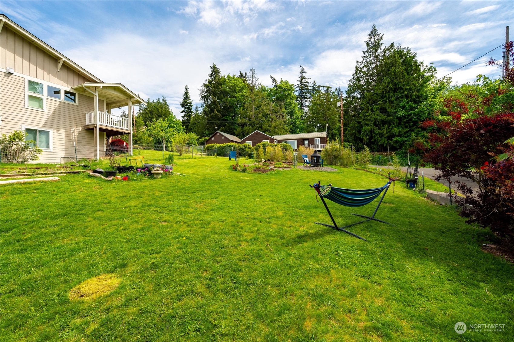 3703 Fielding Avenue Bellingham, WA 98229 - Photo 36 of 40 a view of a chairs in backyard of house