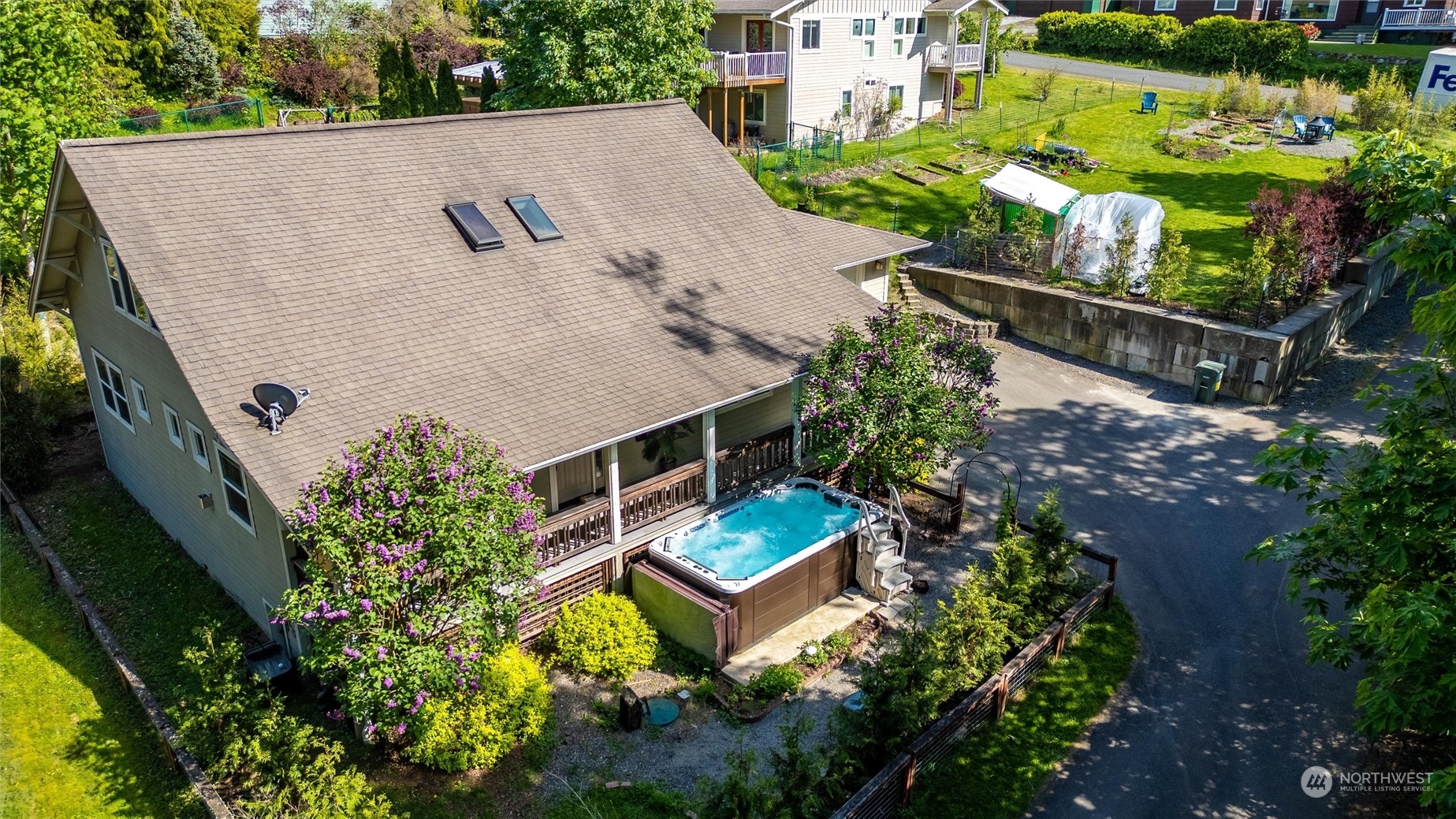 3703 Fielding Avenue Bellingham, WA 98229 - Photo 37 of 40 an aerial view of a house with a garden and swimming pool