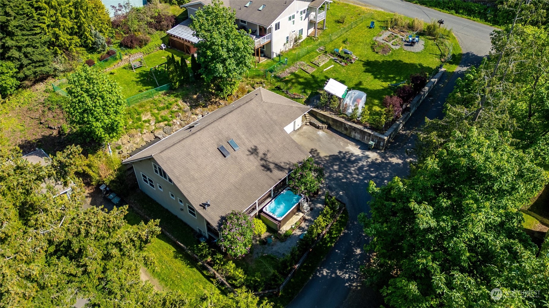 3703 Fielding Avenue Bellingham, WA 98229 - Photo 38 of 40 an aerial view of a house with a yard and outdoor seating