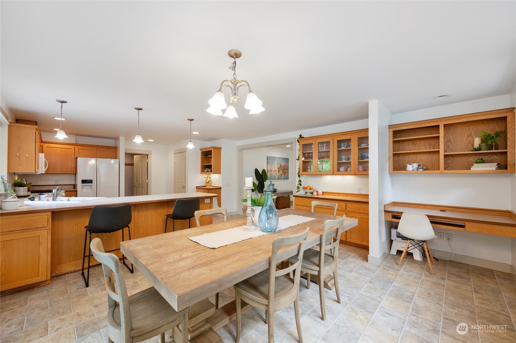 3703 Fielding Avenue Bellingham, WA 98229 - Photo 6 of 40 a view of a dining room with furniture and chandelier
