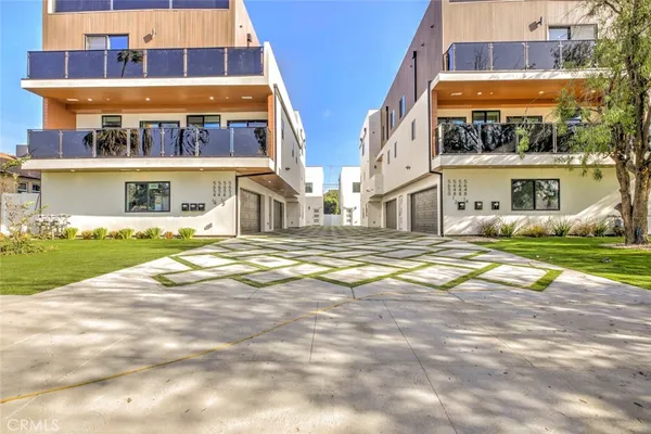 a view of building with an outdoor space and seating area