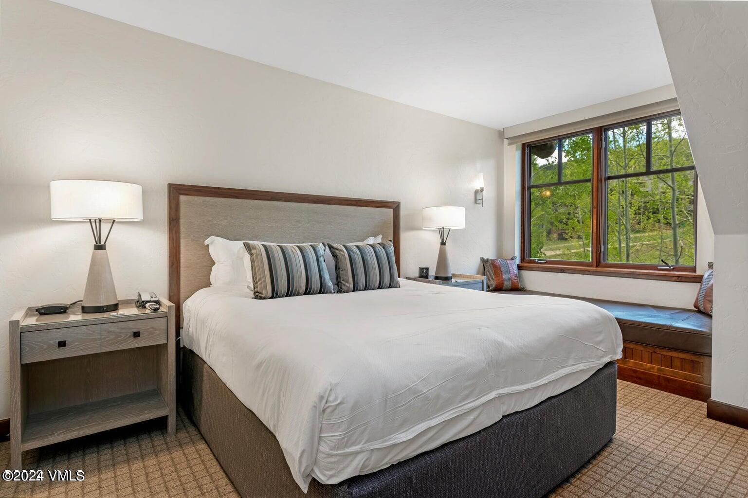 100 Bachelor Ridge Road, Unit 3510 Avon, CO 81620 - Photo 13 of 50 a bedroom with a bed and a window