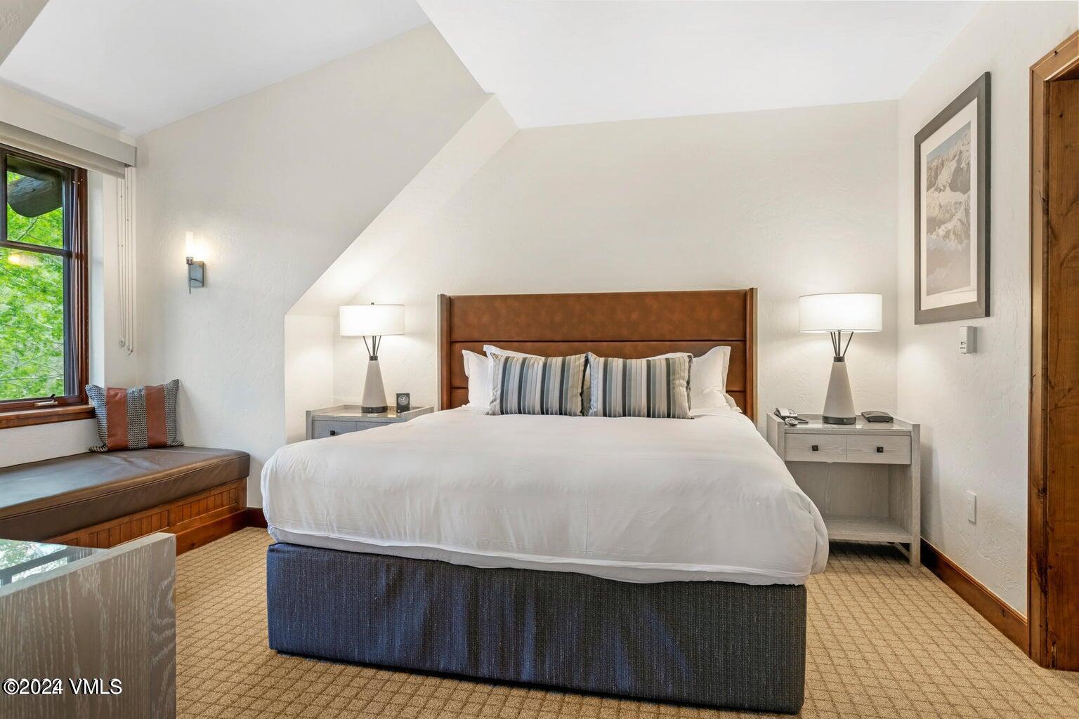 100 Bachelor Ridge Road, Unit 3510 Avon, CO 81620 - Photo 20 of 50 a bedroom with a large bed and a couch