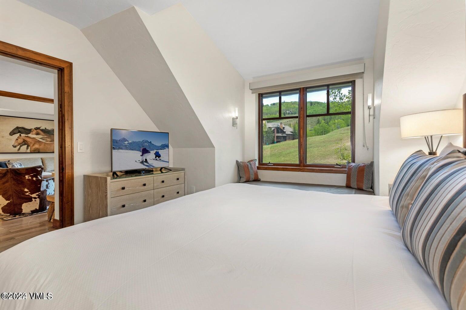 100 Bachelor Ridge Road, Unit 3510 Avon, CO 81620 - Photo 23 of 50 a view of a bedroom with furniture and windows