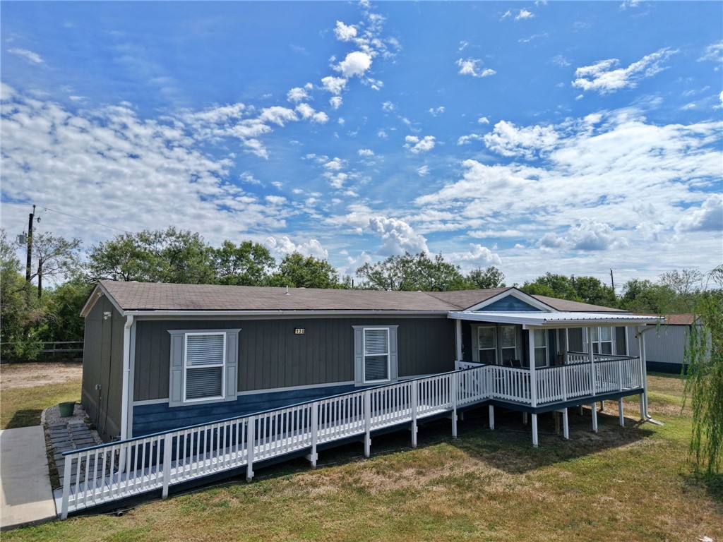 aerial view of a house with a deck