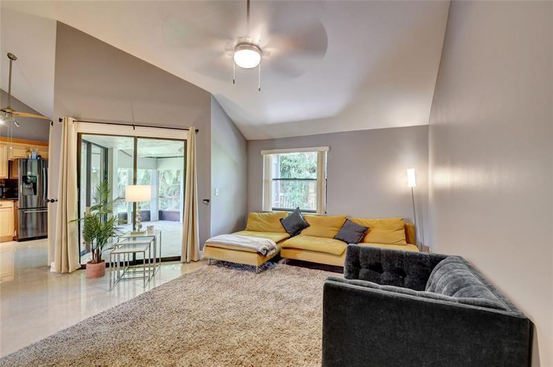 9316 Ketay Circle Boca Raton, FL 33428 - Photo 2 of 30 a living room with furniture and a couch