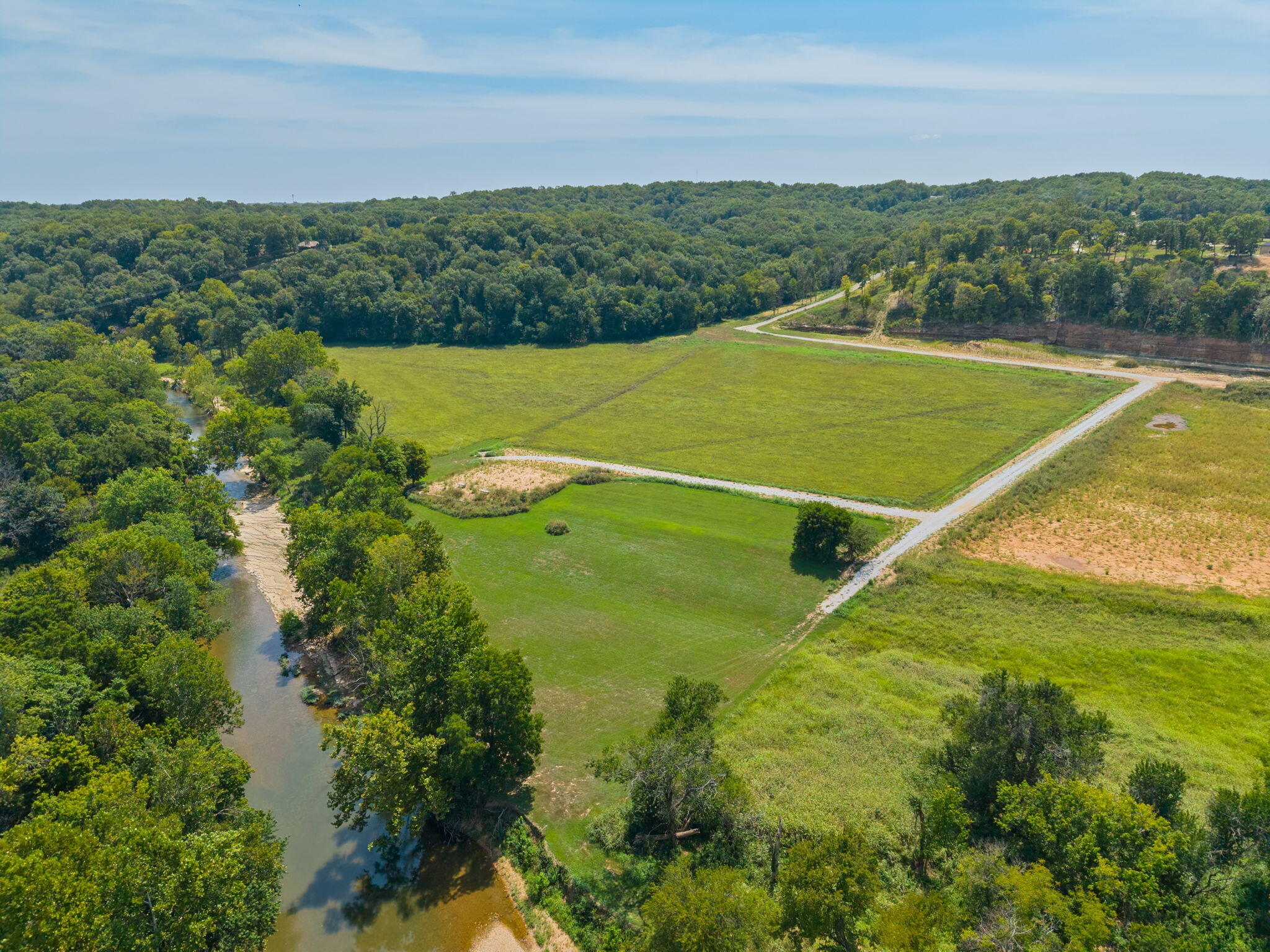 2 Riverpointe View Ozark, MO 65721 - Photo 2 of 17 119-web-or-mls-DJI_20260821123311_0654_D