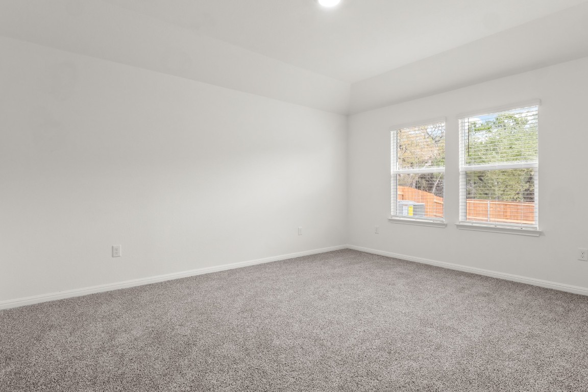 2408 Bronc Buster Way Leander, TX 78641 - Photo 15 of 24 an empty room with a window