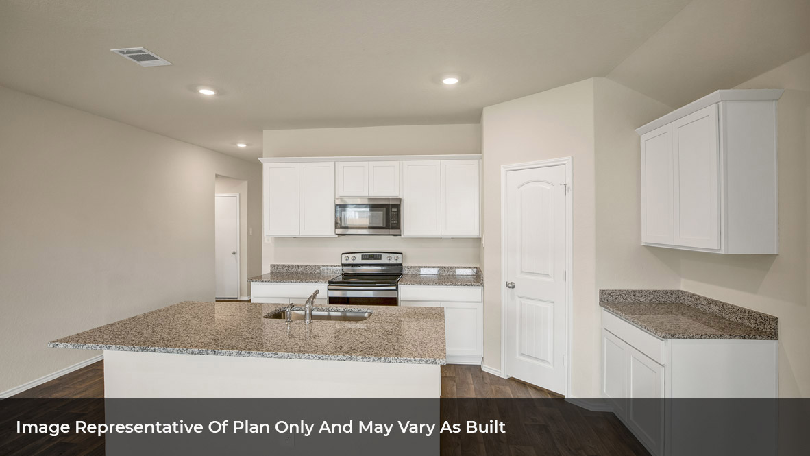 2408 Bronc Buster Way Leander, TX 78641 - Photo 19 of 24 a view of kitchen with stainless steel appliances granite countertop sink stove refrigerator and cabinets
