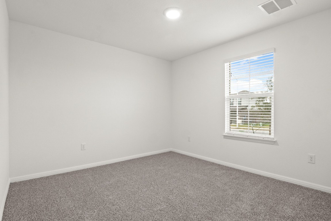 2408 Bronc Buster Way Leander, TX 78641 - Photo 6 of 24 an empty room with a window