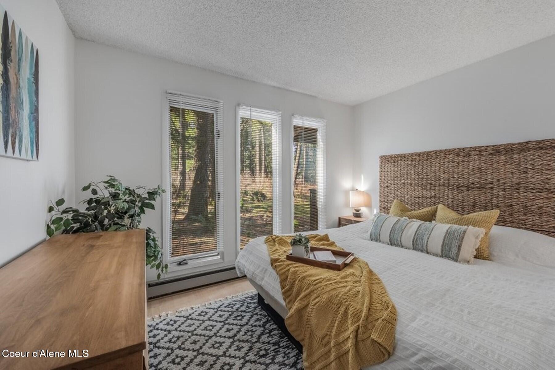 5480 West Racquet Road, Unit 4 Rathdrum, ID 83858 - Photo 10 of 32 Master Bedroom with Nature Views