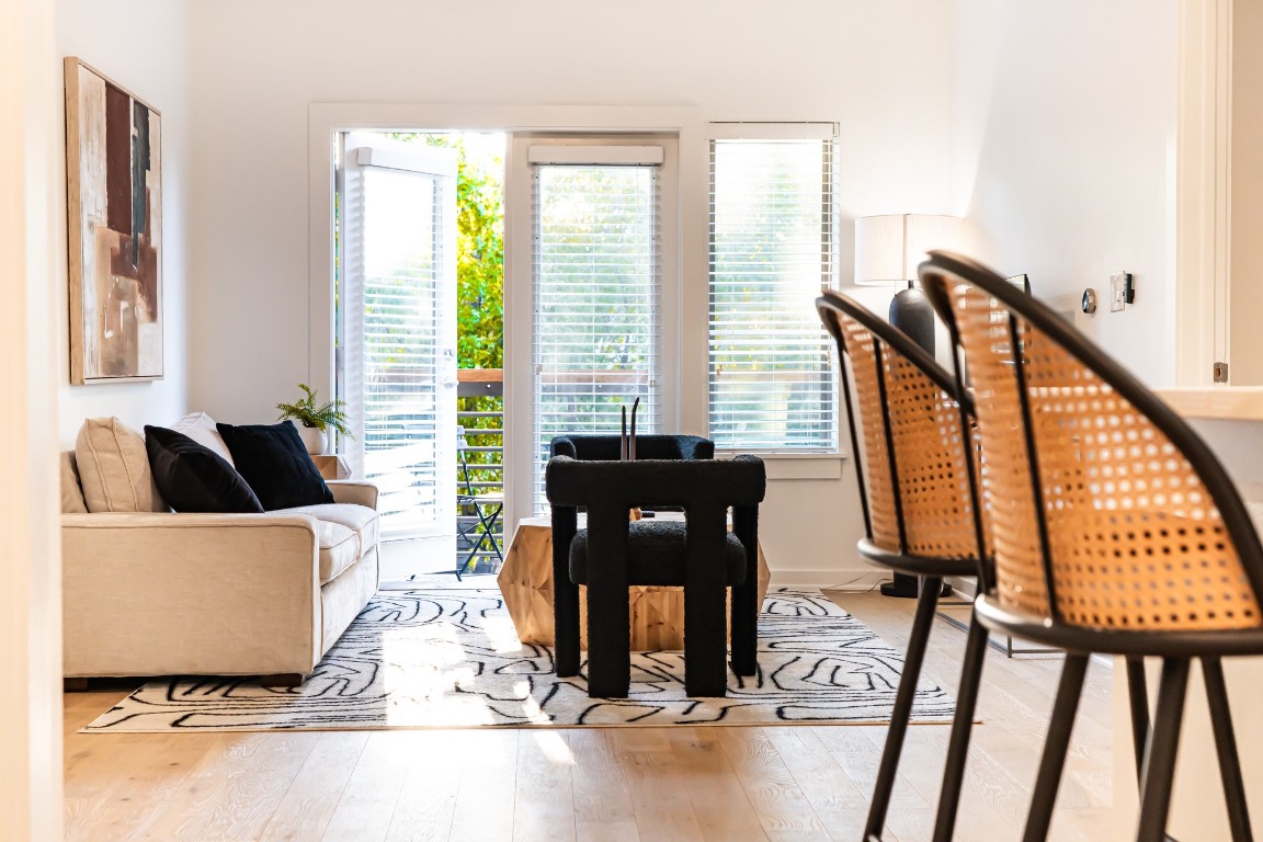 a living room with furniture and a window