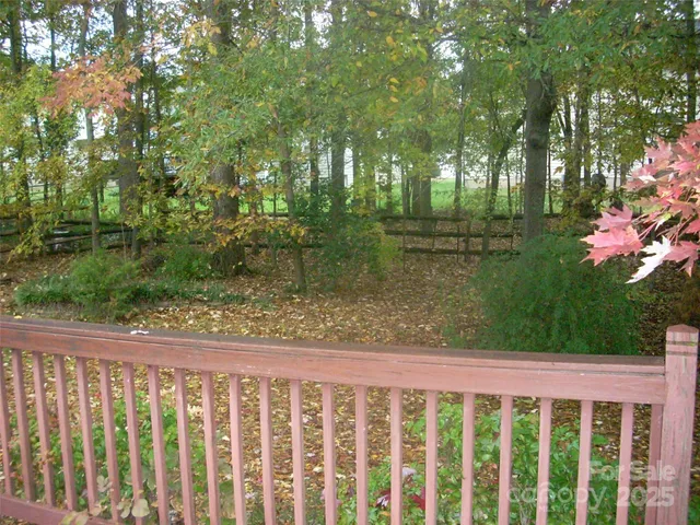a view of a wooden fence