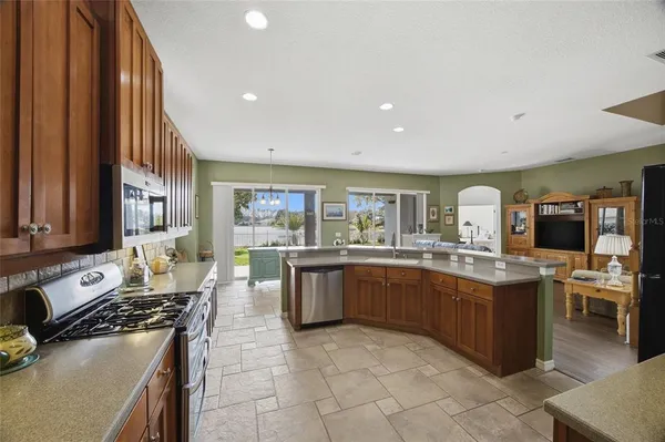 a view of room with window and wooden floor