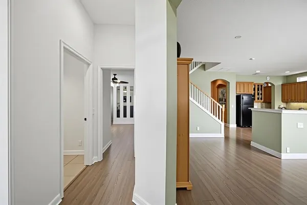 a large bathroom with a tub shower and sink