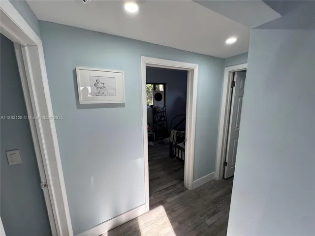 an entryway with a hallway