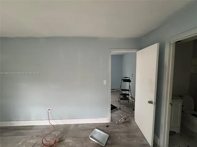 a view of a livingroom with wooden floor
