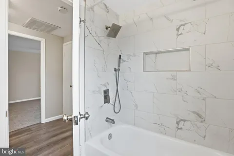 a bathroom with a bathtub