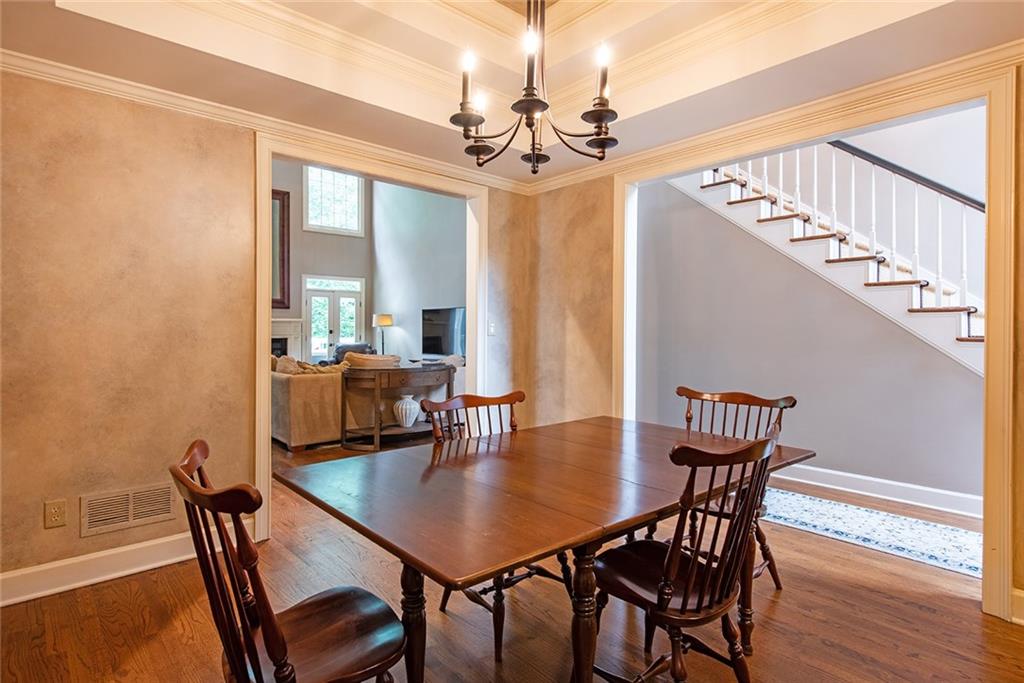 3854 Sidestreet Atlanta, GA 30341 - Photo 11 of 83 a view of a dining room with furniture window and wooden floor