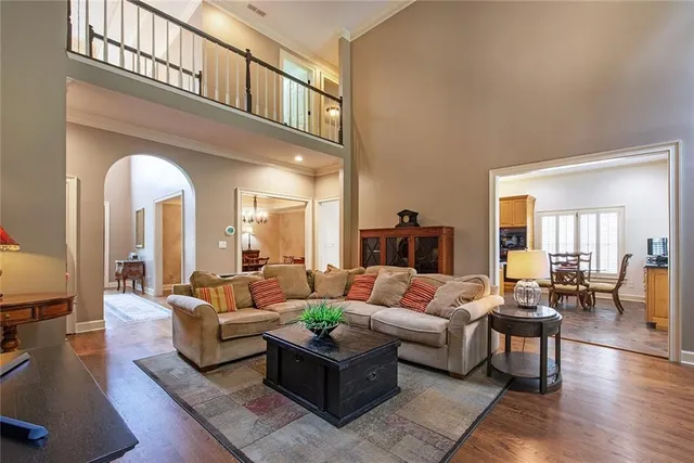 a kitchen with stainless steel appliances granite countertop a sink a stove top oven a counter space and cabinets