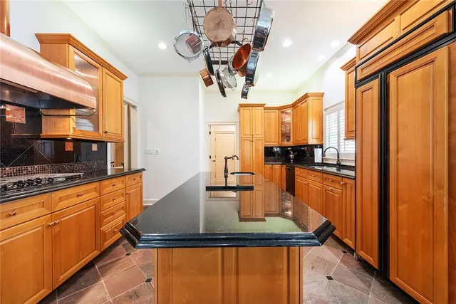 a view of a dining room with furniture and a window