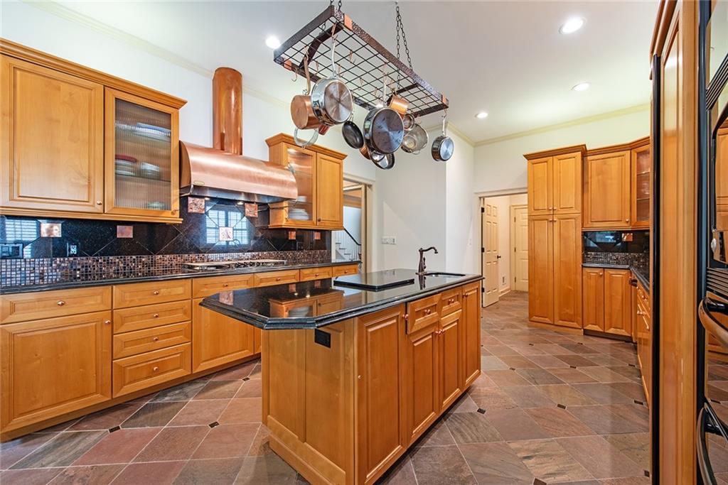 3854 Sidestreet Atlanta, GA 30341 - Photo 21 of 83 a kitchen with stainless steel appliances granite countertop a sink and cabinets
