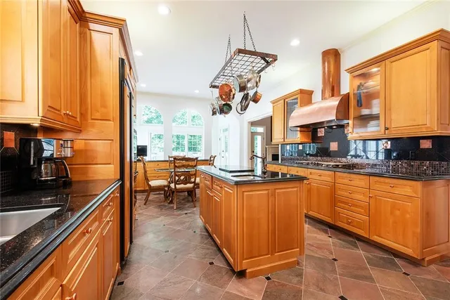 a view of an empty room with a large window