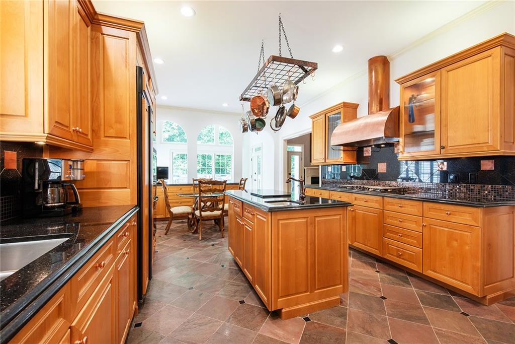 3854 Sidestreet Atlanta, GA 30341 - Photo 22 of 83 a kitchen with stainless steel appliances granite countertop sink stove and cabinets