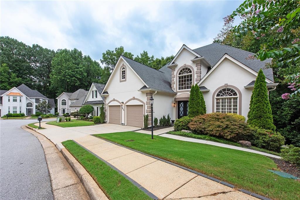 3854 Sidestreet Atlanta, GA 30341 - Photo 3 of 83 a front view of a house with a yard