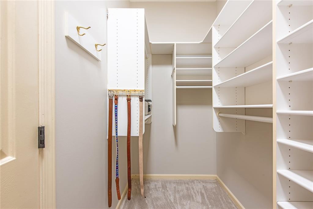 3854 Sidestreet Atlanta, GA 30341 - Photo 41 of 83 a view of walk in closet with empty racks