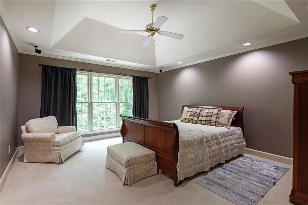 3854 Sidestreet Atlanta, GA 30341 - Photo 46 of 83 a bedroom with a bed and a couch