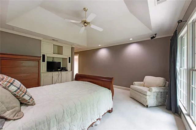 an empty room with a empty space and a ceiling fan