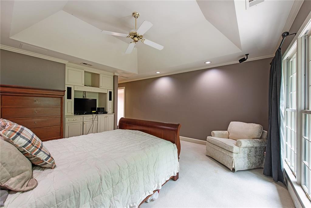 3854 Sidestreet Atlanta, GA 30341 - Photo 47 of 83 a bedroom with a bed and a window