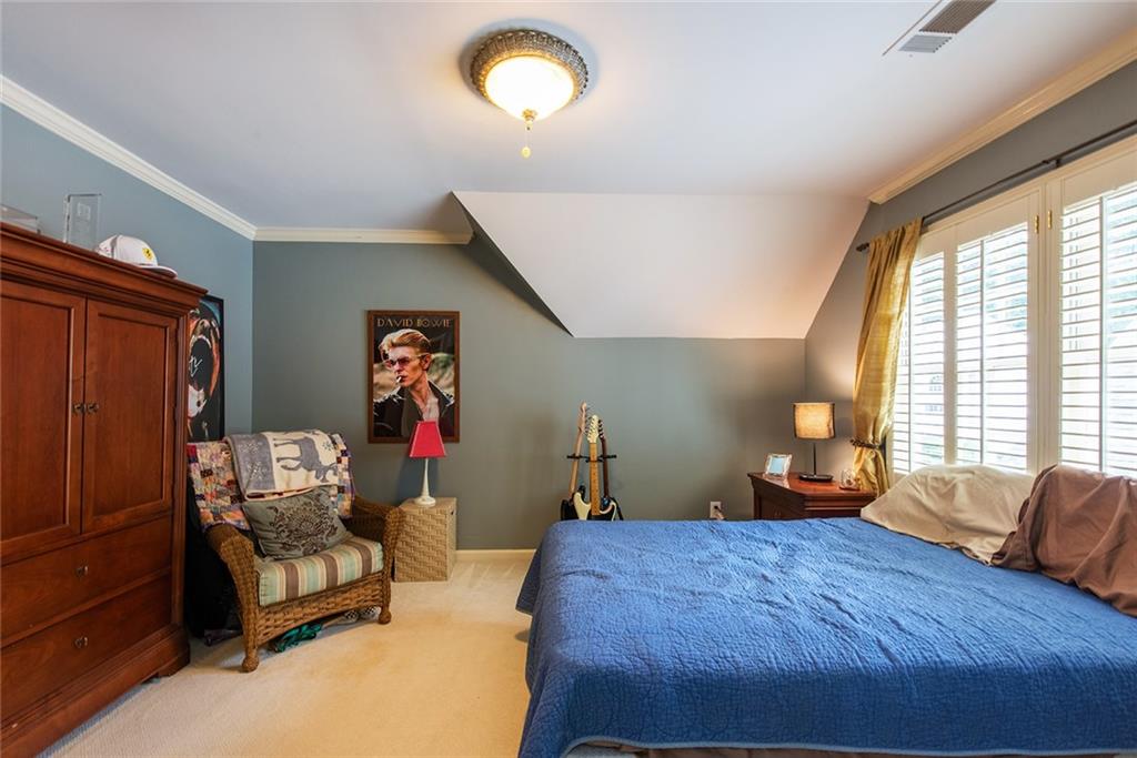 3854 Sidestreet Atlanta, GA 30341 - Photo 54 of 83 a bedroom with a bed and a couch