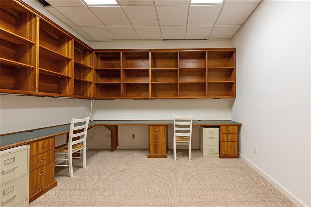 3854 Sidestreet Atlanta, GA 30341 - Photo 61 of 83 a view of an empty room with empty shelves