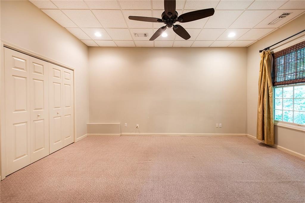 3854 Sidestreet Atlanta, GA 30341 - Photo 63 of 83 an empty room with windows and fan