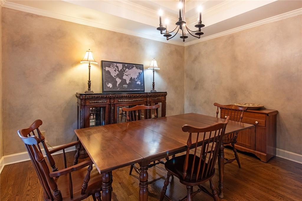 3854 Sidestreet Atlanta, GA 30341 - Photo 9 of 83 a view of a dining room with furniture and wooden floor