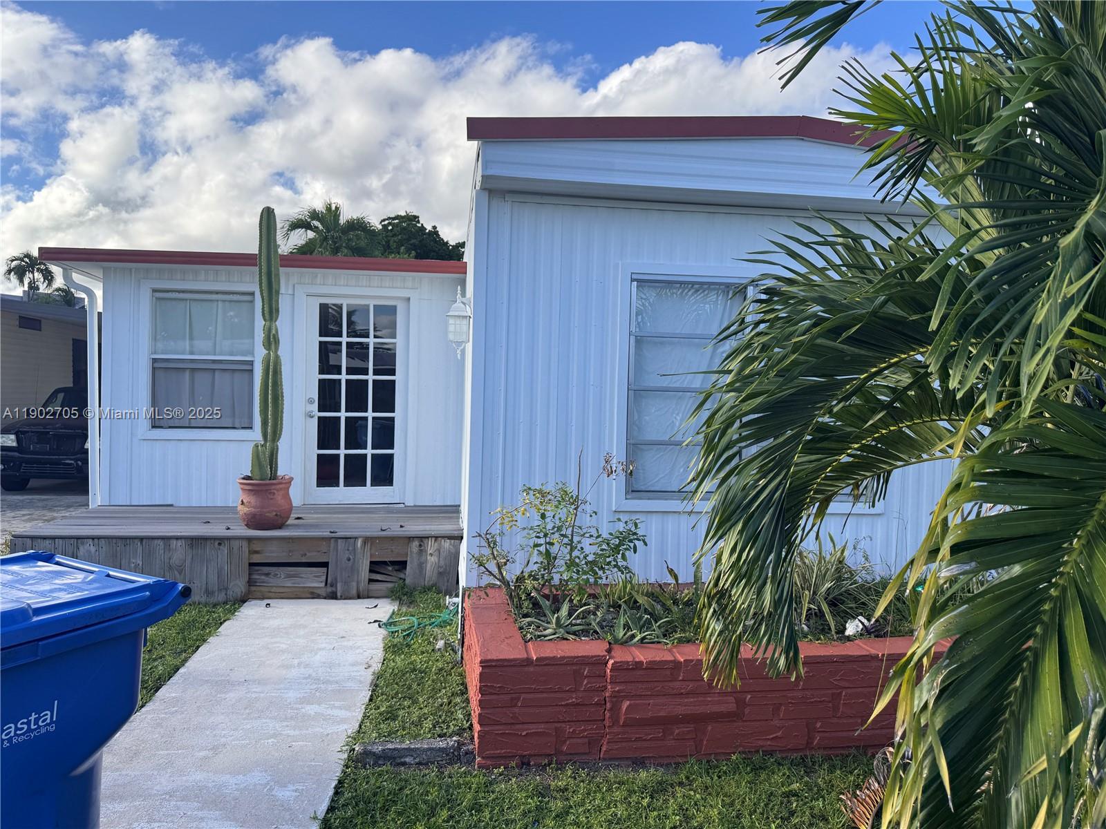 5331 Southwest 35th Street Davie, FL 33314 - Photo 19 of 21 a house view with a garden space