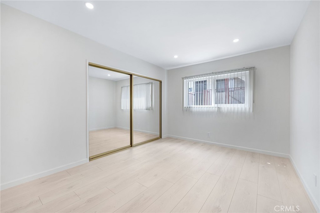 580 West Stocker Street, Unit 6 Glendale, CA 91202 - Photo 11 of 17 an empty room with windows and closet
