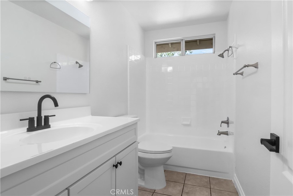 11189 Summerside Lane Rancho Cucamonga, CA 91737 - Photo 21 of 30 a bathroom with a sink a toilet and shower