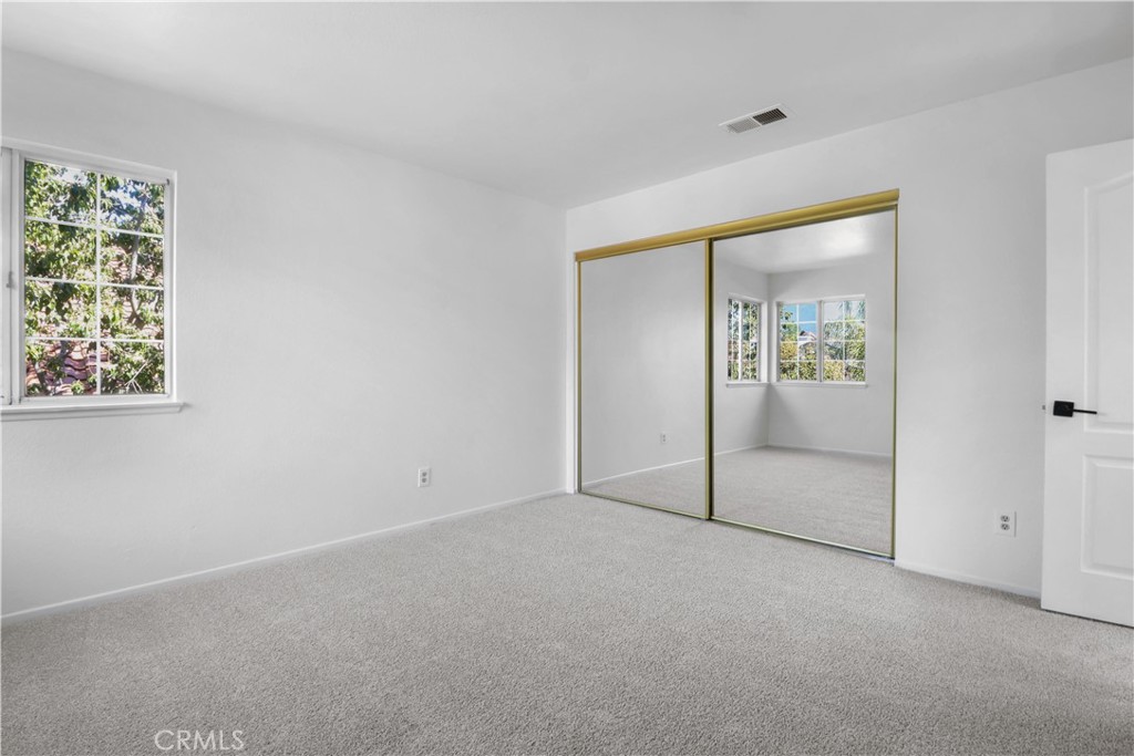 11189 Summerside Lane Rancho Cucamonga, CA 91737 - Photo 25 of 30 an empty room with windows