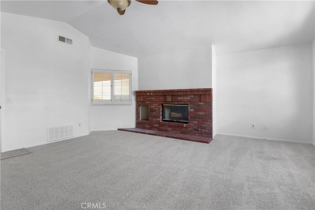 11189 Summerside Lane Rancho Cucamonga, CA 91737 - Photo 26 of 30 an empty room with a fireplace