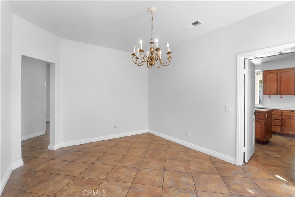11189 Summerside Lane Rancho Cucamonga, CA 91737 - Photo 8 of 30 a view of a chandelier in an empty room