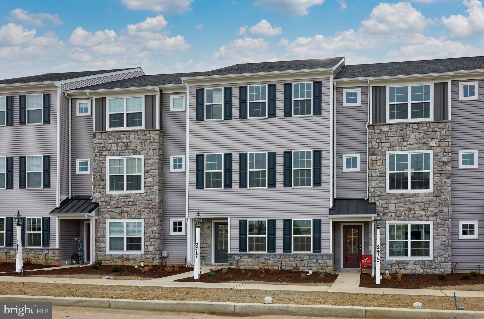 2417 Spring Water Circle Lancaster, PA 17601 - Photo 2 of 35 a front view of a residential apartment building