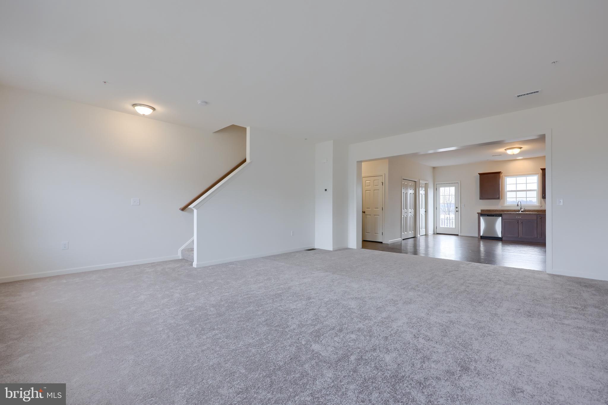 2417 Spring Water Circle Lancaster, PA 17601 - Photo 26 of 35 a view of an empty room with a kitchen
