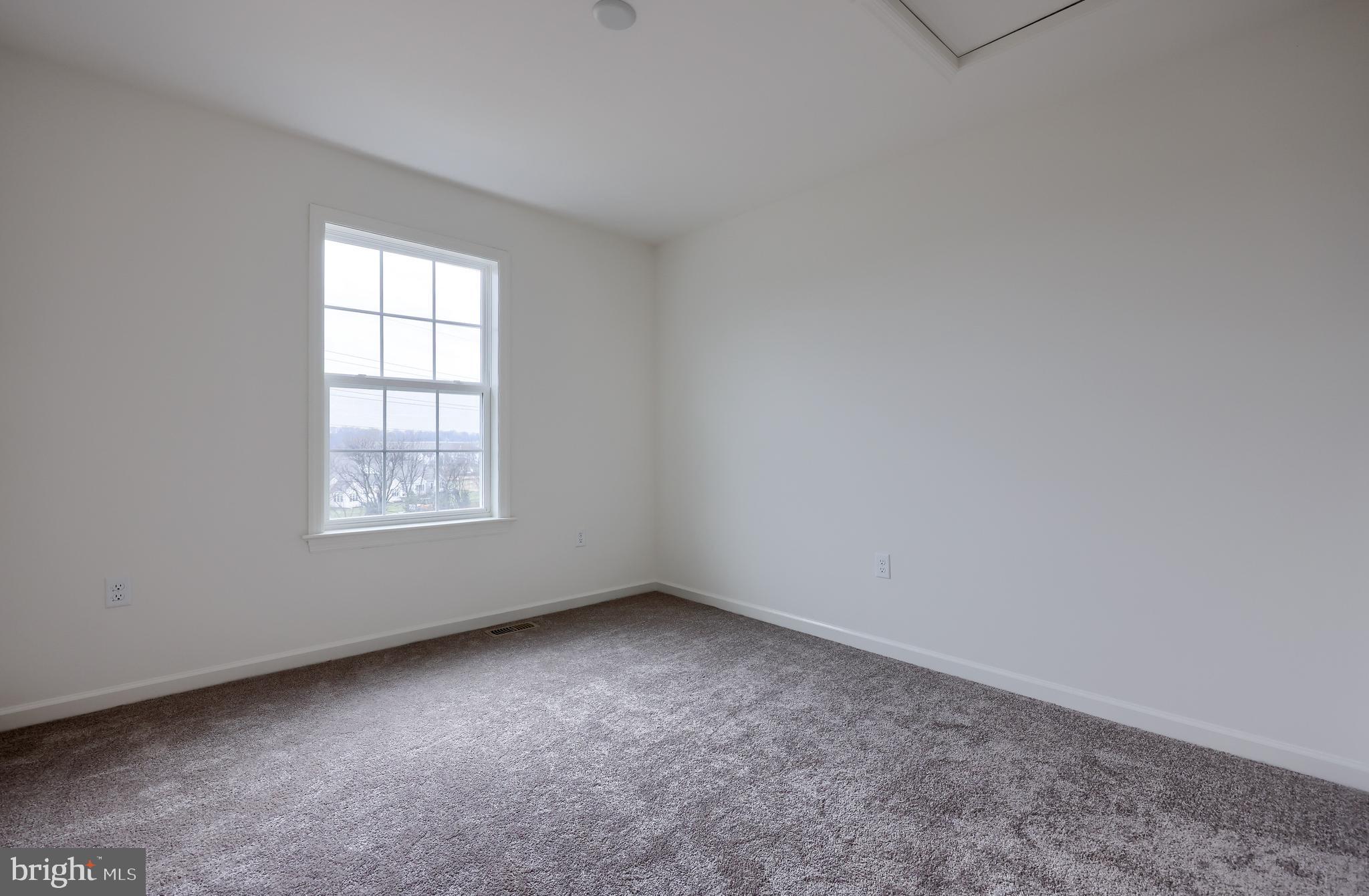 2417 Spring Water Circle Lancaster, PA 17601 - Photo 32 of 35 an empty room with a window