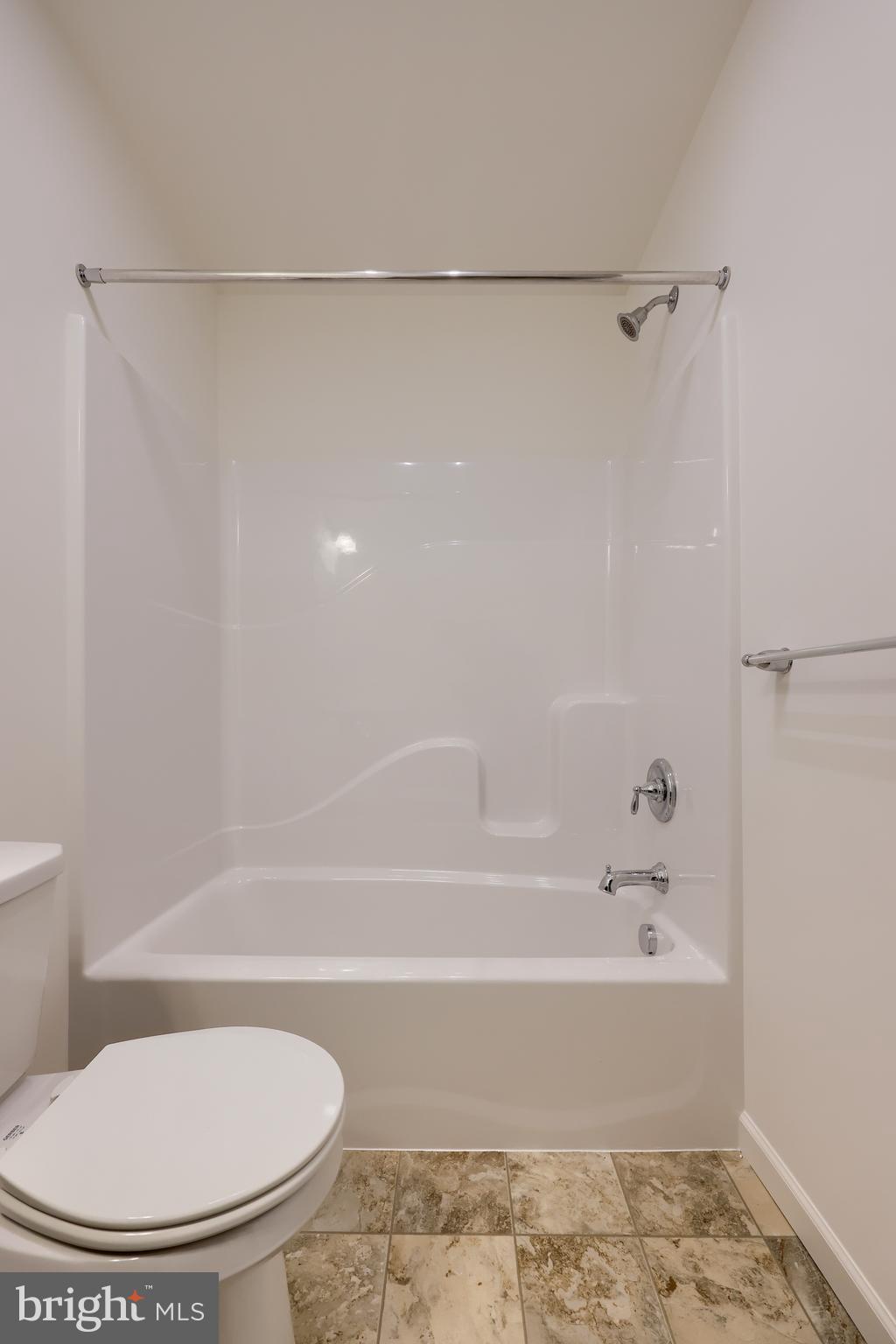 2417 Spring Water Circle Lancaster, PA 17601 - Photo 34 of 35 a bathroom with a toilet and a bathtub