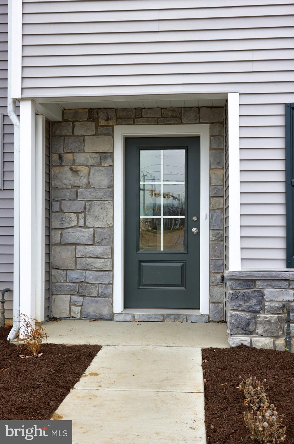 2417 Spring Water Circle Lancaster, PA 17601 - Photo 4 of 35 a front view of a house with a window